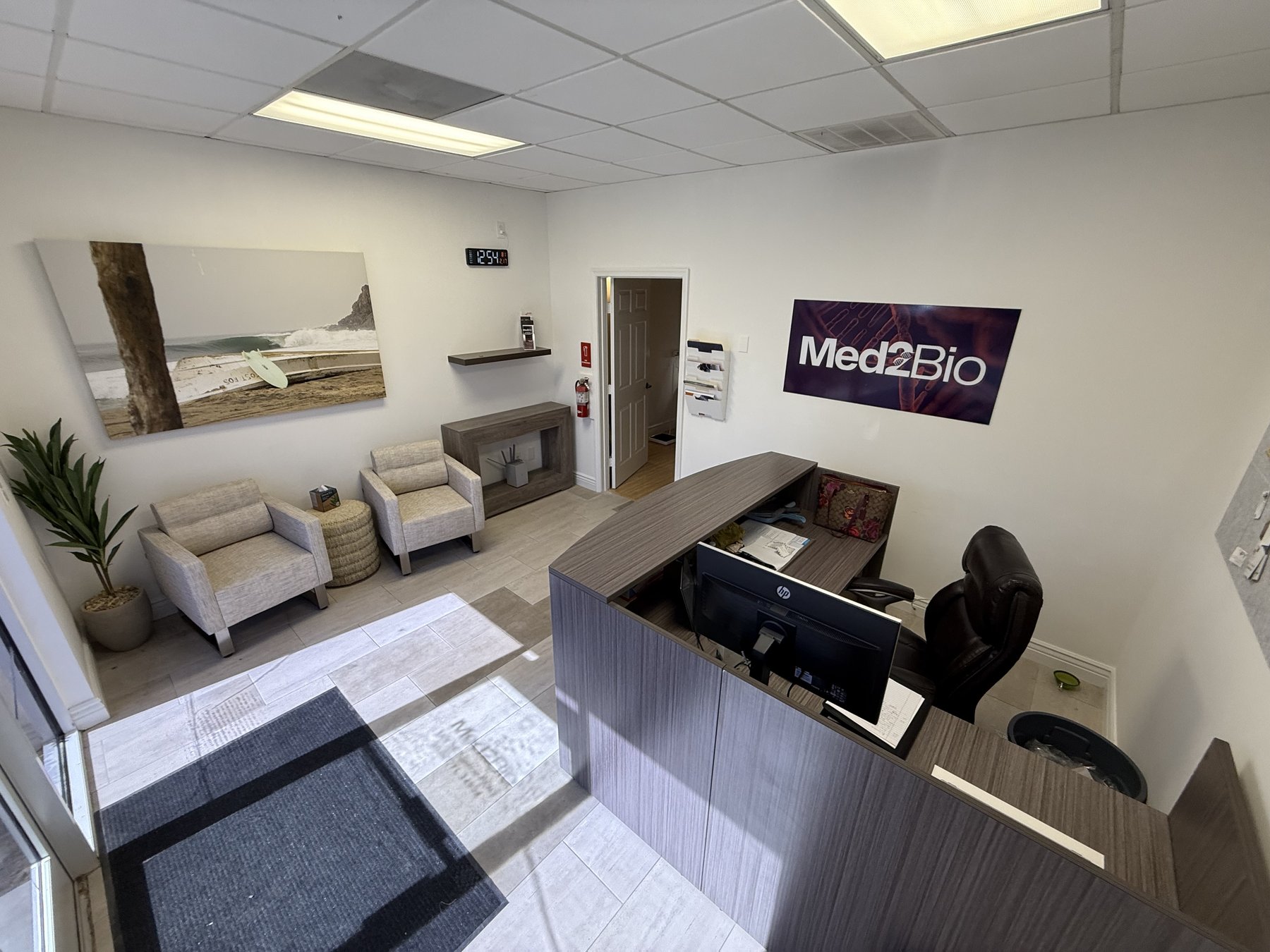 Med2Bio reception and waiting area with Med2Bio signage